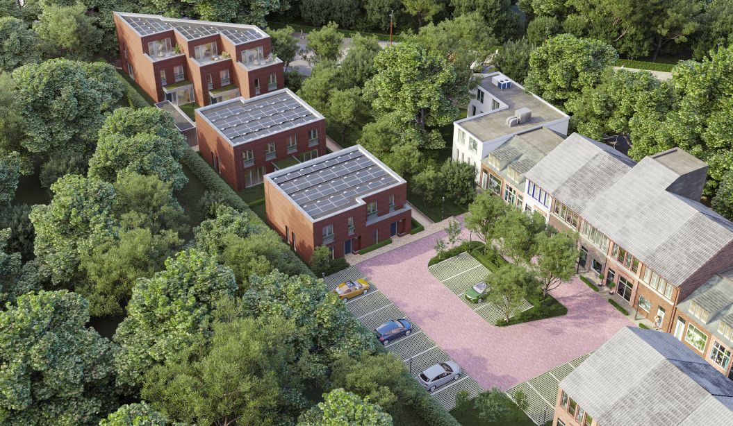 Impressie nieuwbouw Kovelaar Utrecht met baksteenblokken, zonnepanelen, groene hof en parkeervakken.