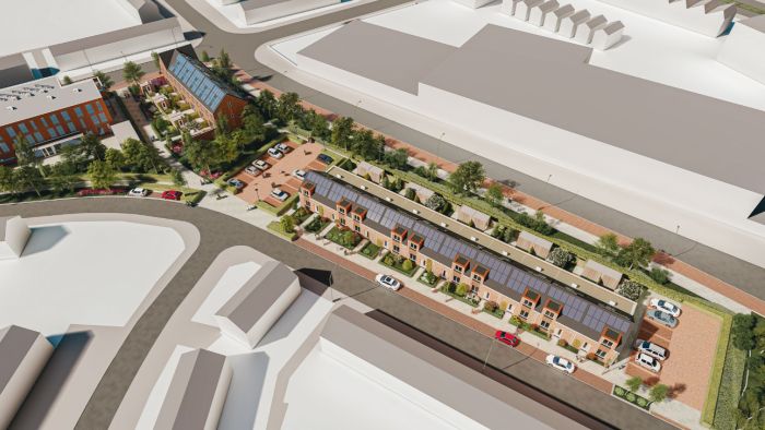 Emmalaan Roermond – vogelvluchtimpressie van rijwoningen met zonnepanelen, parkeervakken en groene strook tussen twee straten