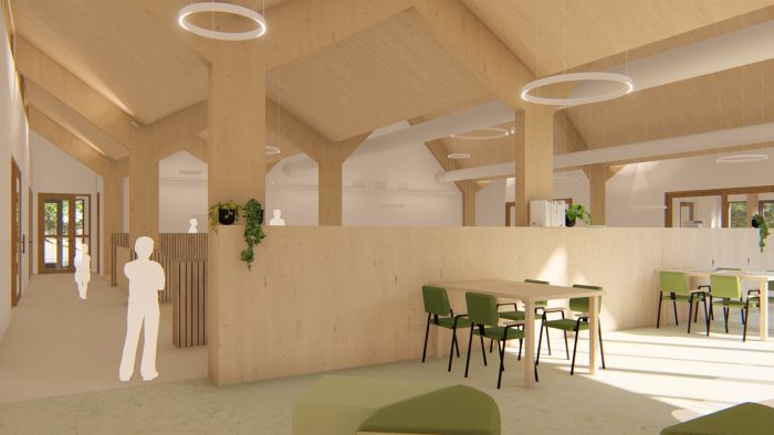 Leerplein SKC Berg en Terblijt met warme houtafwerking, zitpods, brede trap en zichtlijnen