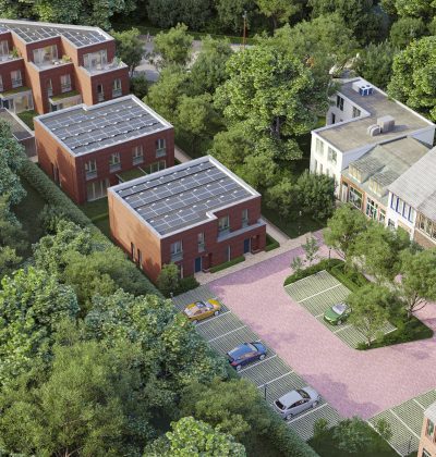 Impressie nieuwbouw Kovelaar Utrecht met baksteenblokken, zonnepanelen, groene hof en parkeervakken.