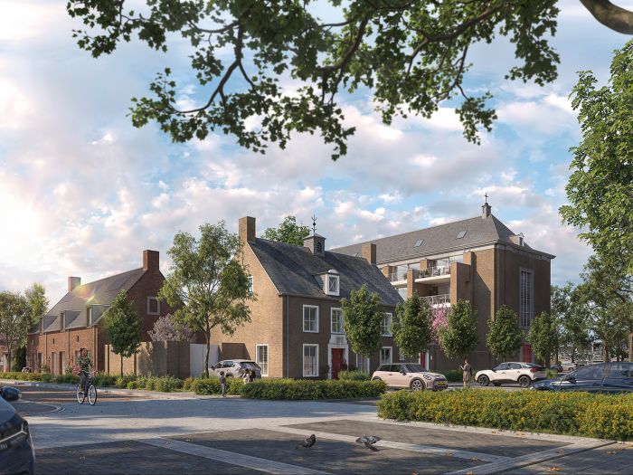 Transformatie Mariakerk Valkenswaard – impressie van herbestemde kerk met nieuwe appartementen en gerenoveerde geveltjes rond groen plein, auto’s en fietsers in straatbeeld.
